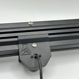 close up of rear wolfbox rear camera bracket mount with light and hardware intsalled and flask logo